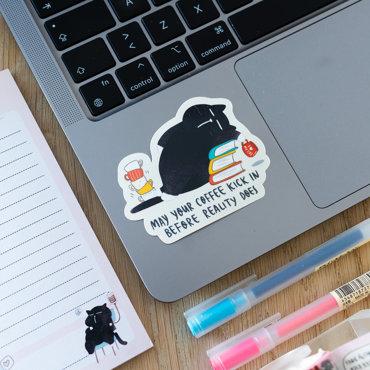 "May your coffee kick in before reality does" Funny coffee quote Mocha cat sticker