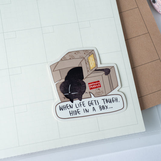 "When life gets tough, hide in a box" - Mocha Cat Motivational Vinyl Sticker